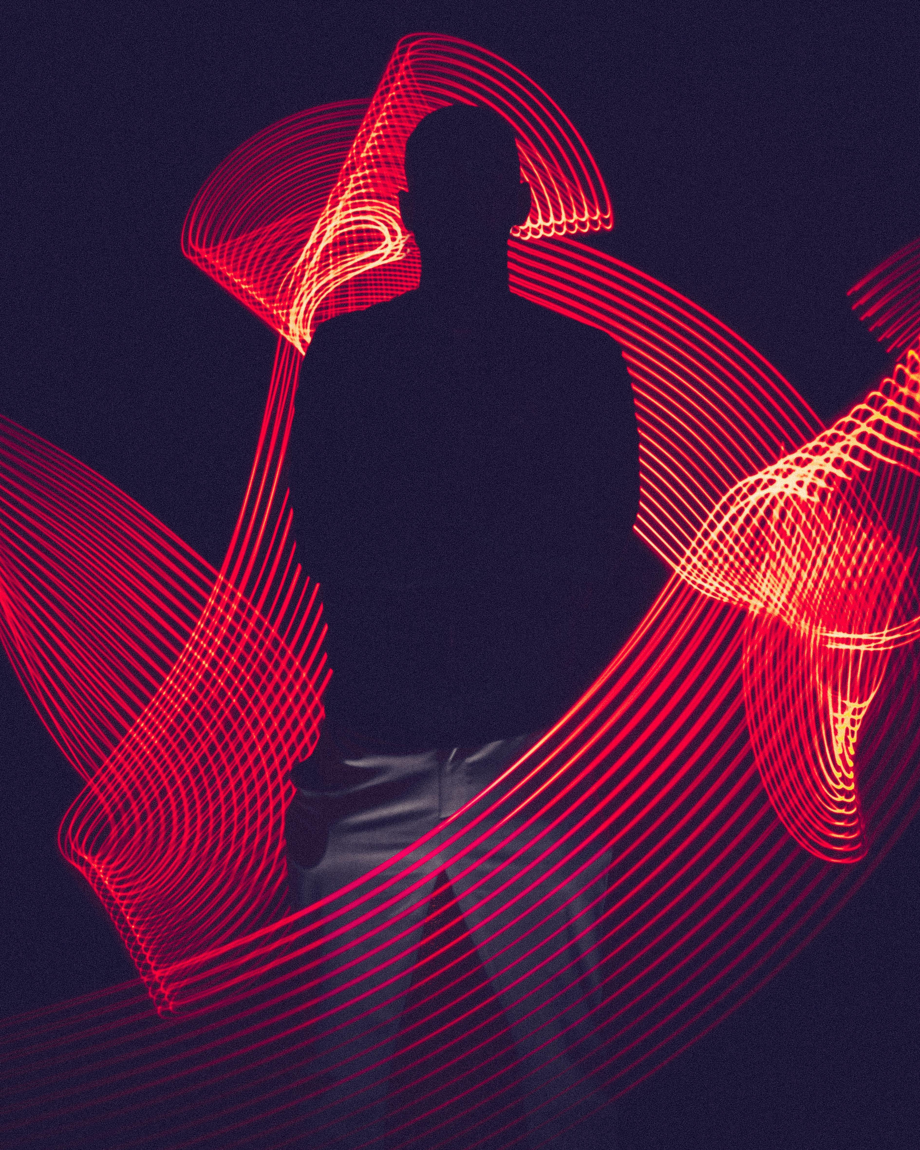 Future Trends - a futuristic silhouette of a person surrounded by lasers