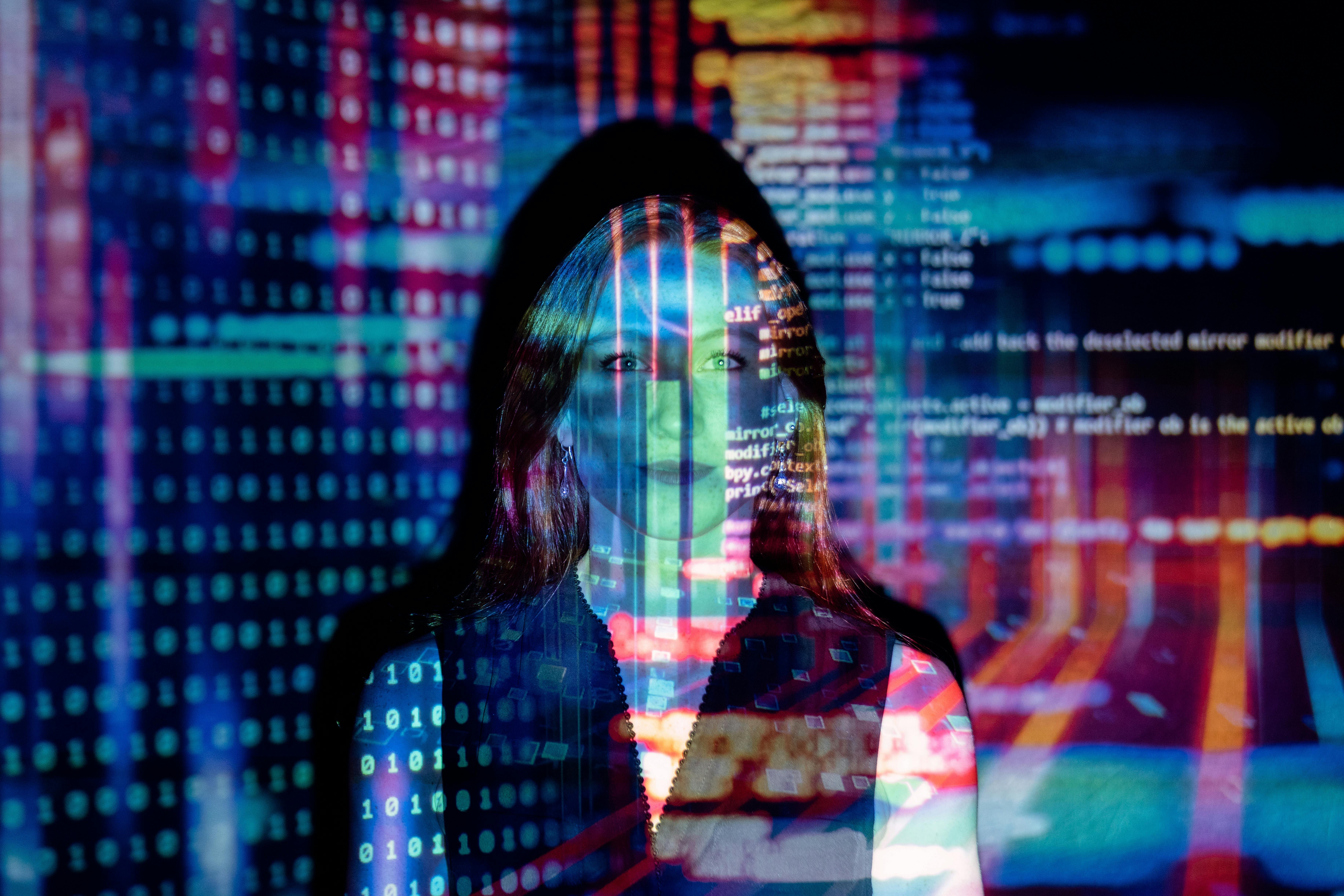Code projected on a data analyst